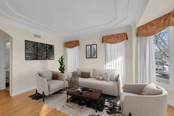 a living room with furniture and a window