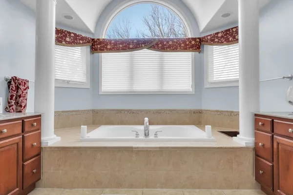 a bathroom with a sink and a bathtub