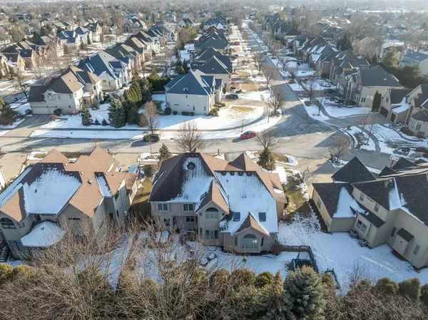 an aerial view of a house with a swimming pool