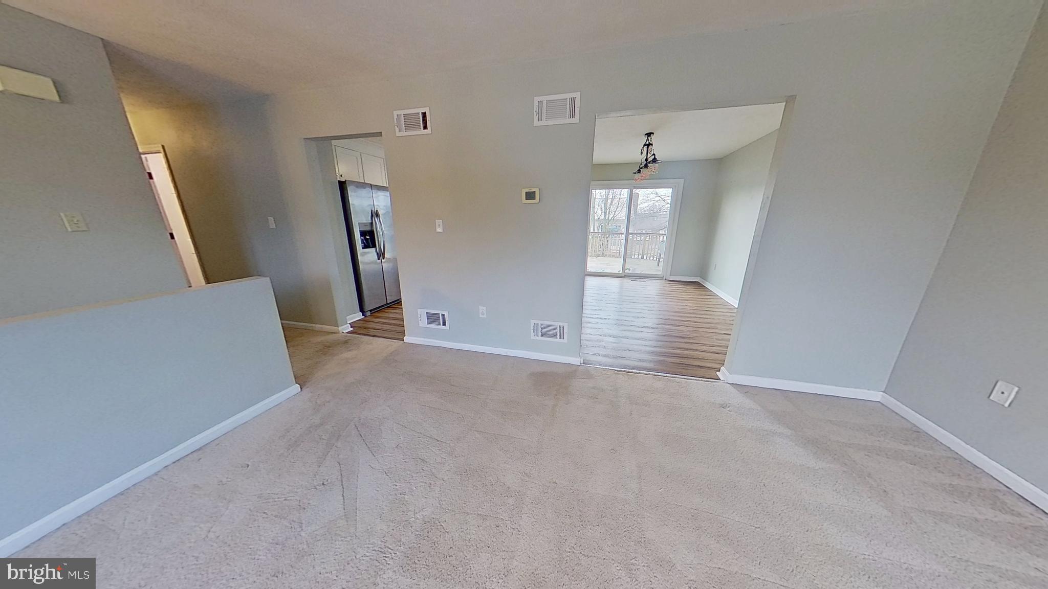 300 Kendale Road Red Lion, PA 17356 - Photo 2 of 16 wooden floor in an empty room with a window
