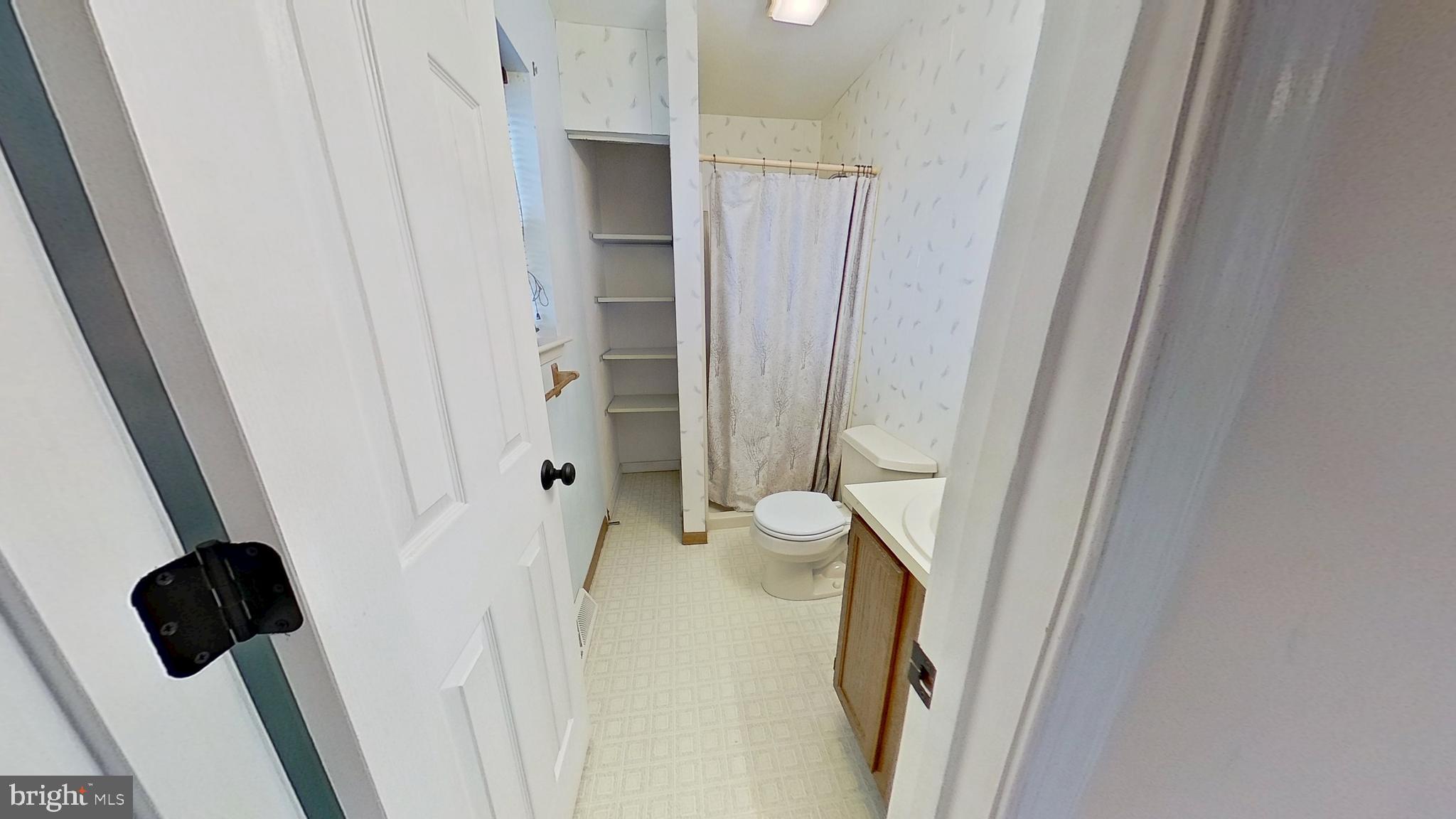 300 Kendale Road Red Lion, PA 17356 - Photo 8 of 16 a bathroom with a tub and a shower