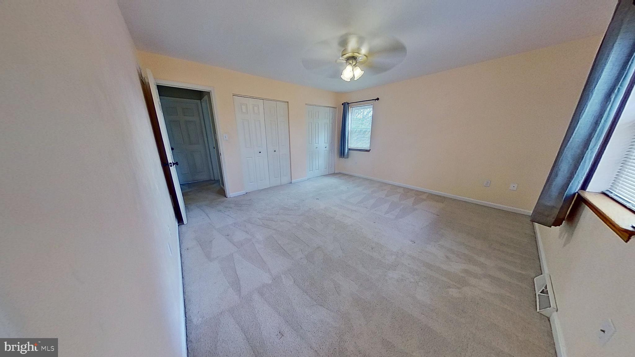 300 Kendale Road Red Lion, PA 17356 - Photo 10 of 16 a view of an empty room with window and wooden floor