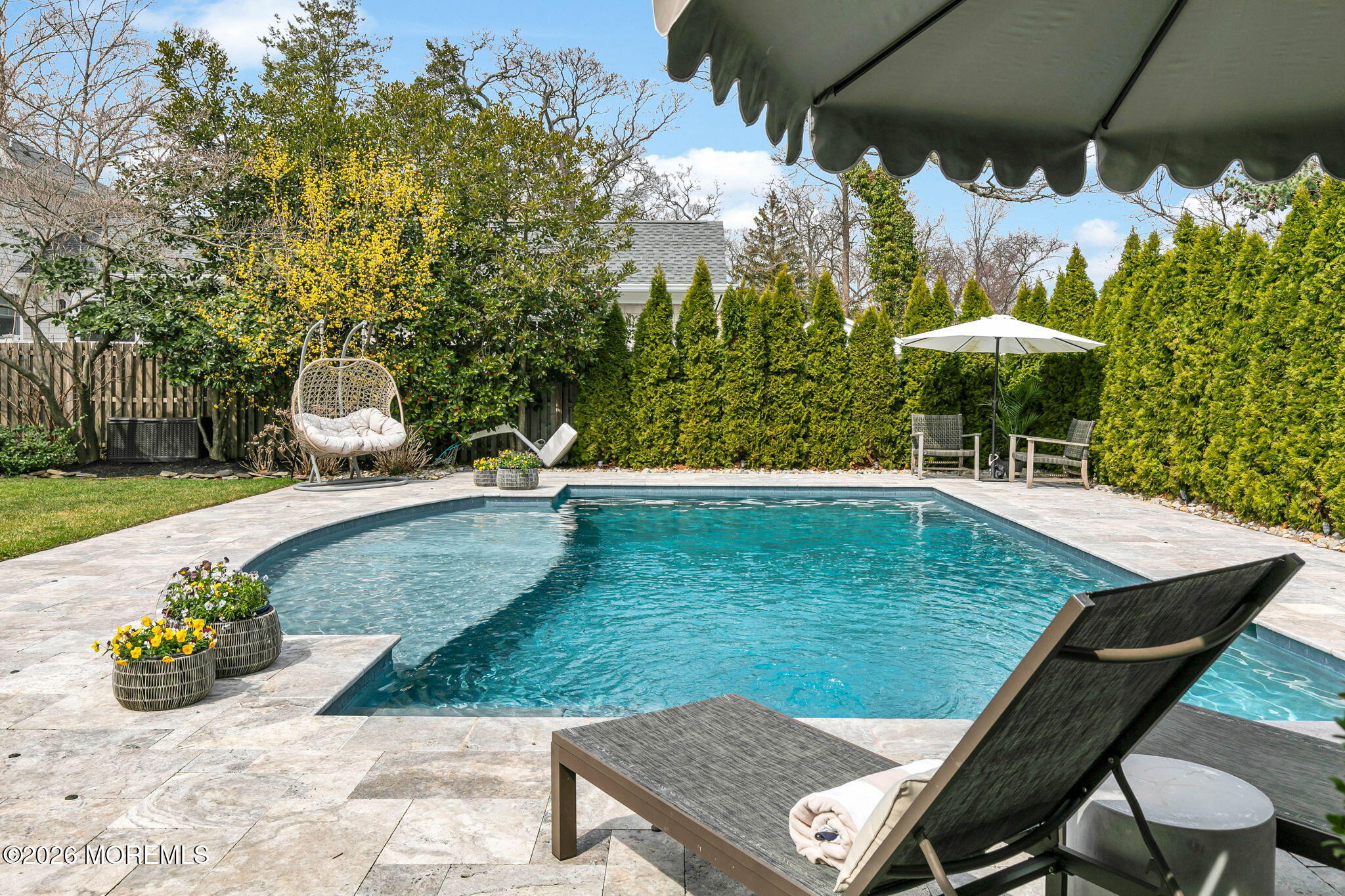 43 Bingham Avenue Rumson, NJ 07760 - Photo 34 of 59 a view of a swimming pool with a patio and plants