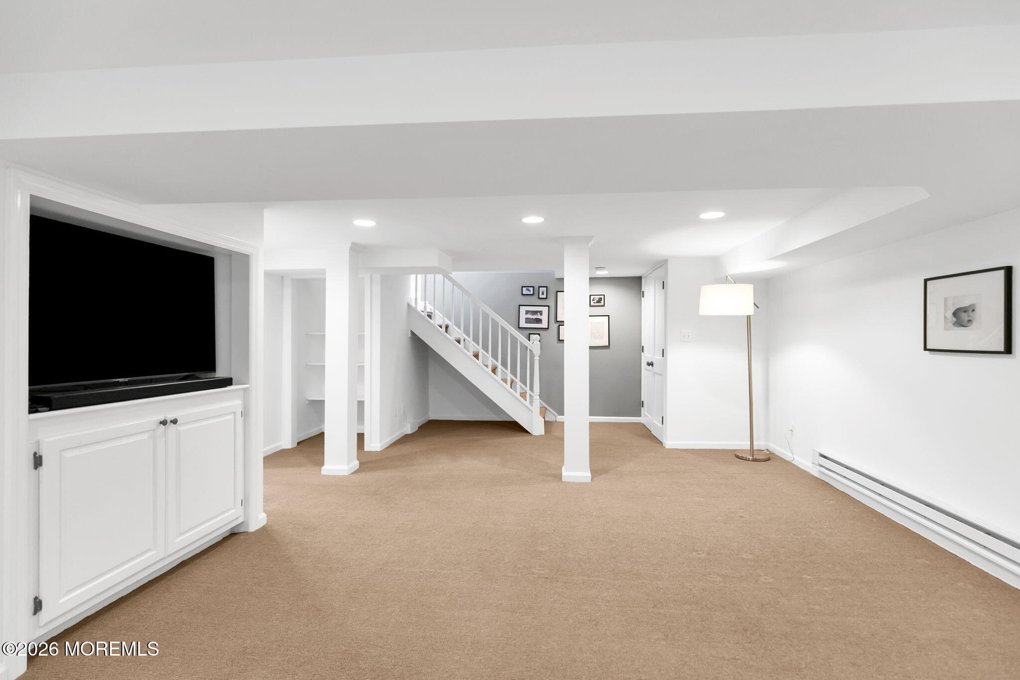 43 Bingham Avenue Rumson, NJ 07760 - Photo 38 of 59 a view of an empty room with a flat screen tv