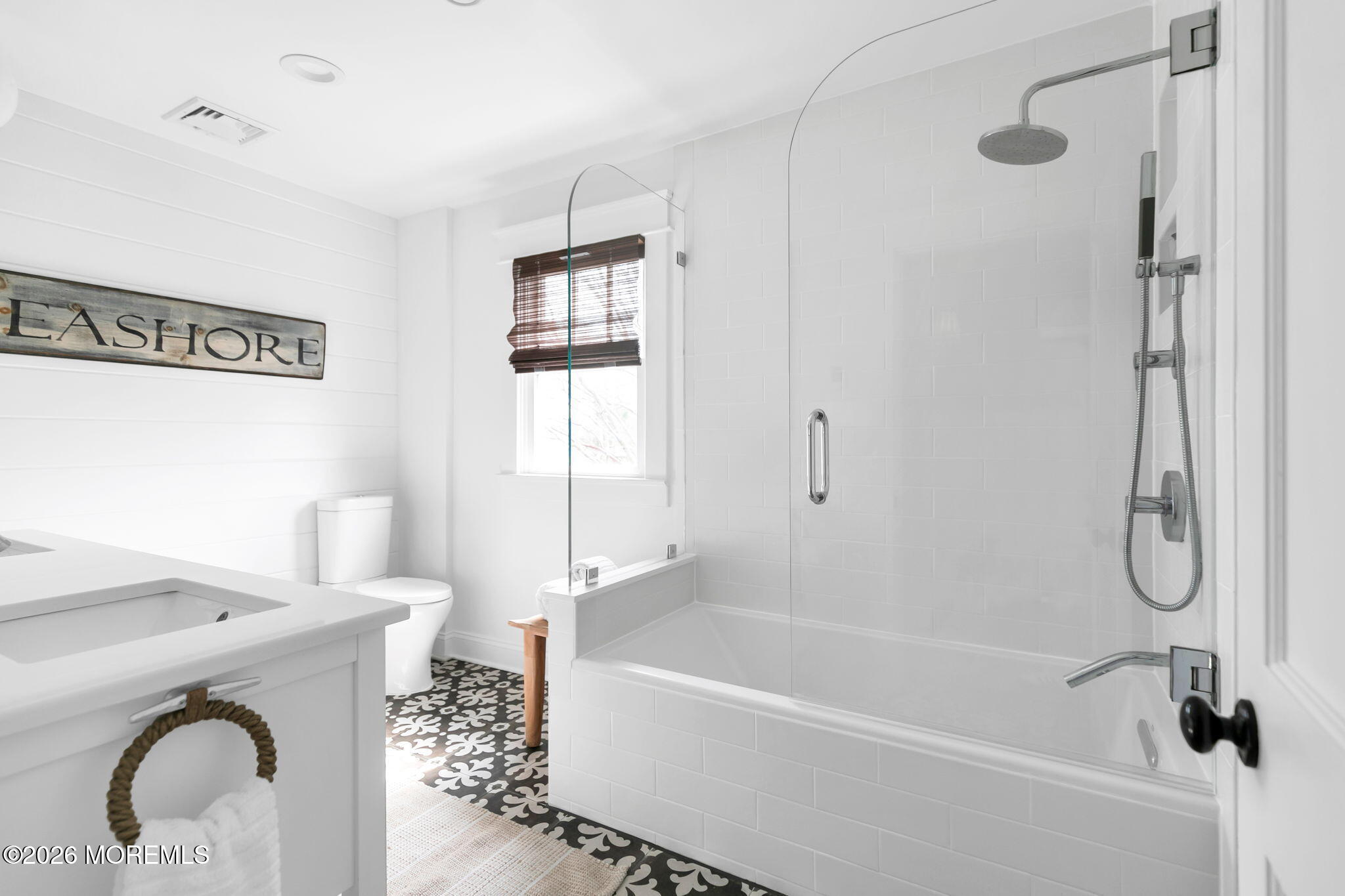 43 Bingham Avenue Rumson, NJ 07760 - Photo 46 of 59 a bathroom with a granite countertop bathtub shower sink and vanity