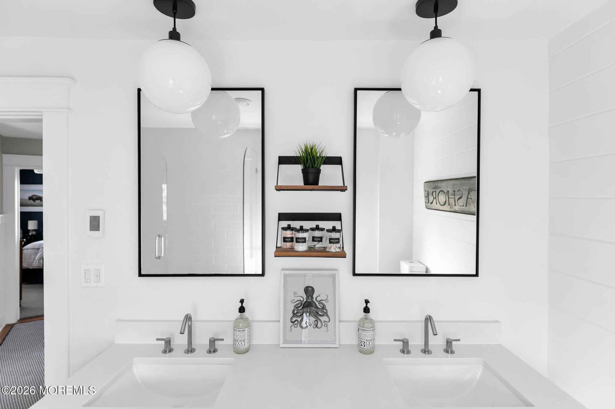 43 Bingham Avenue Rumson, NJ 07760 - Photo 48 of 59 a bathroom with double vanity sinks and a mirror