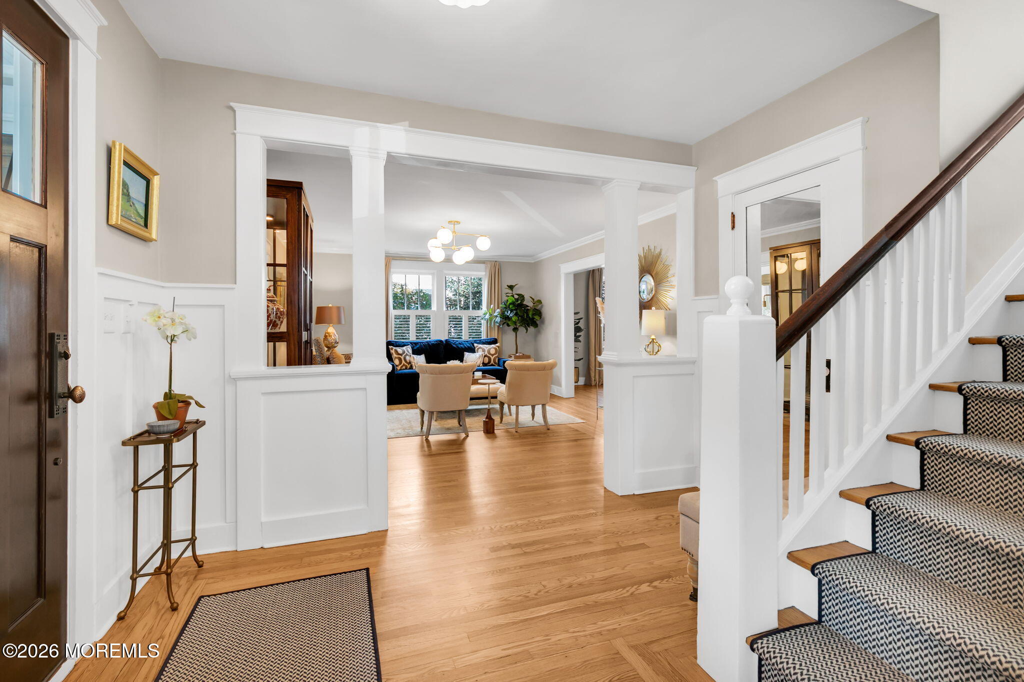43 Bingham Avenue Rumson, NJ 07760 - Photo 8 of 59 a view of an entryway with wooden floor and a livingroom