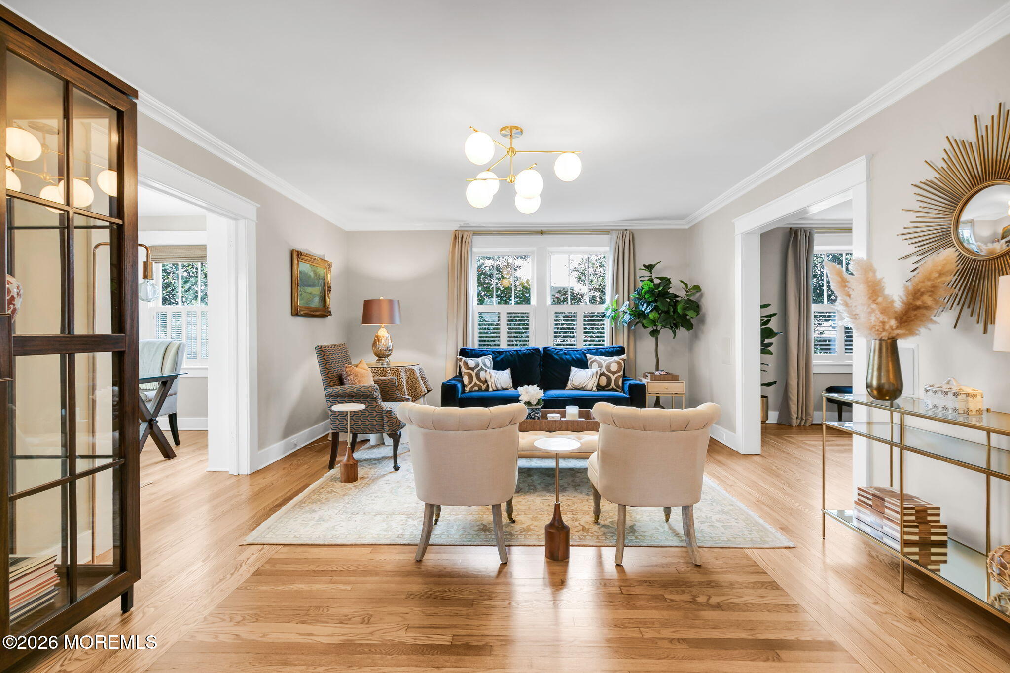 43 Bingham Avenue Rumson, NJ 07760 - Photo 9 of 59 a view of a dining room with furniture a chandelier and wooden floor
