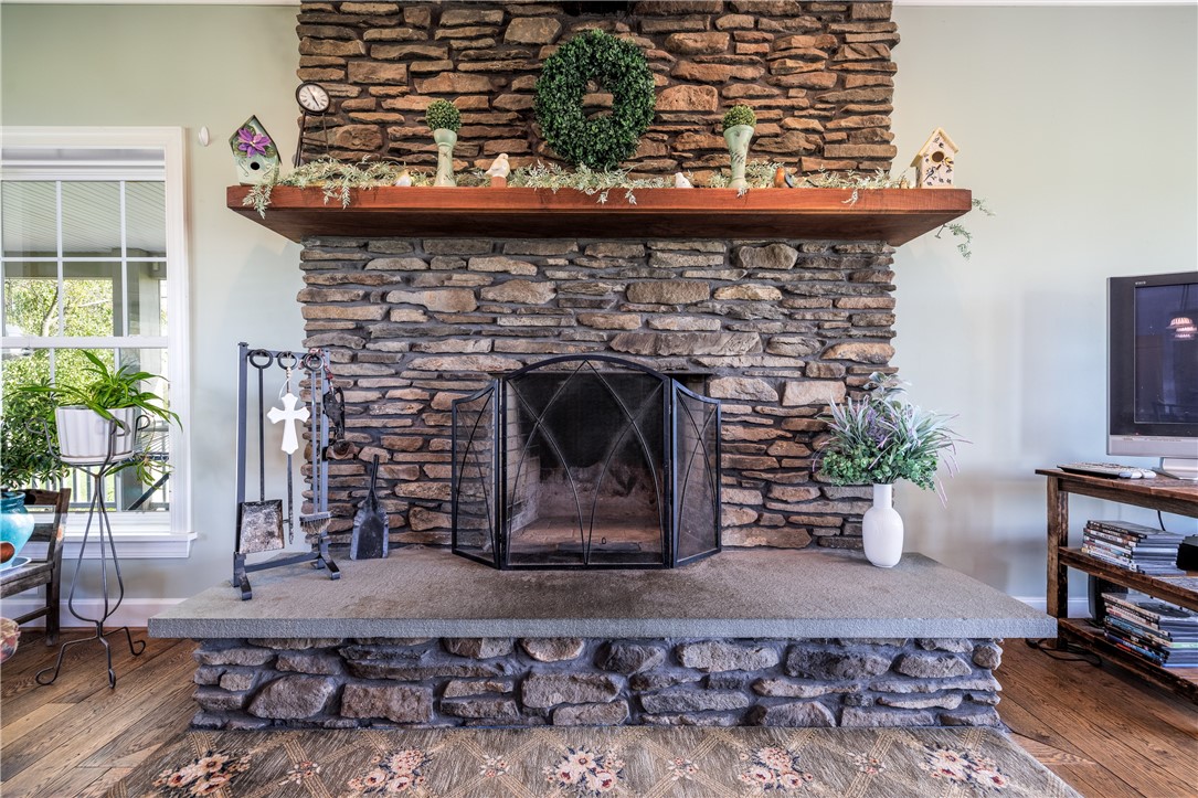 4128 River Road York, NY 14533 - Photo 19 of 50 STONE FIREPLACE GREAT ROOM