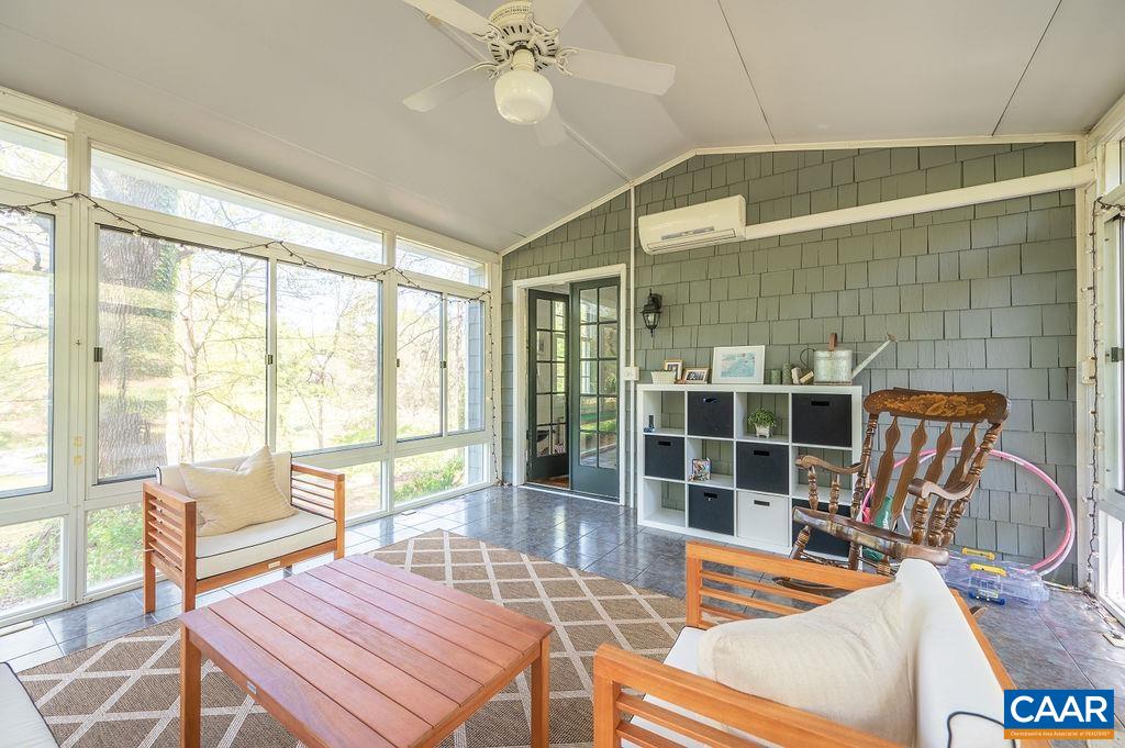 19 Old Farm Road Charlottesville, VA 22903 - Photo 13 of 29 a outdoor living space with furniture and a potted plant