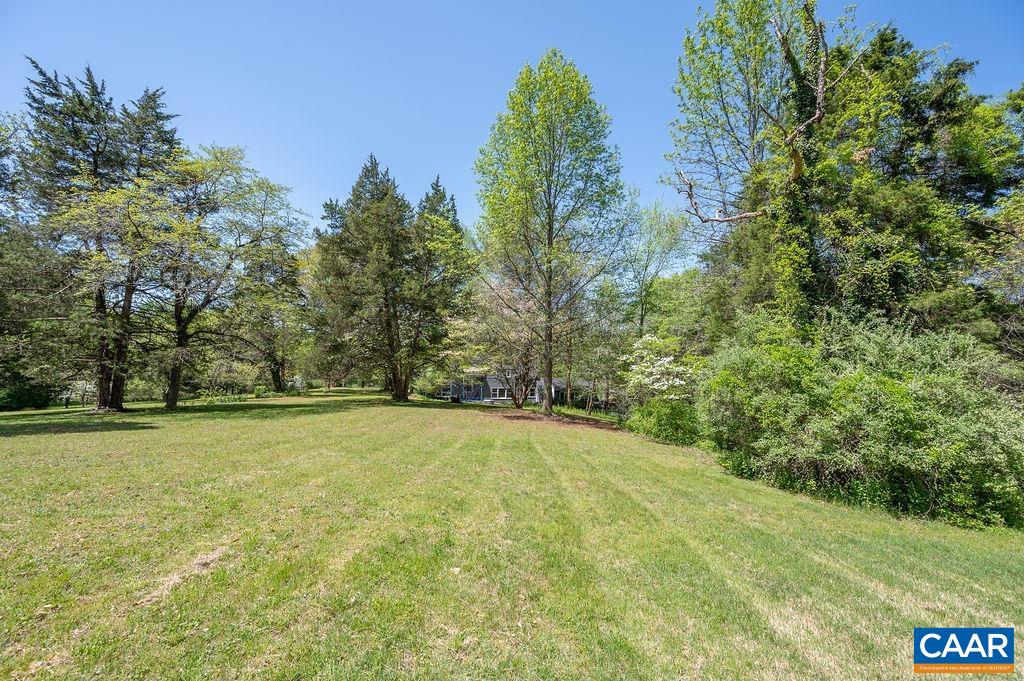 19 Old Farm Road Charlottesville, VA 22903 - Photo 27 of 29 a view of a field with trees in the background