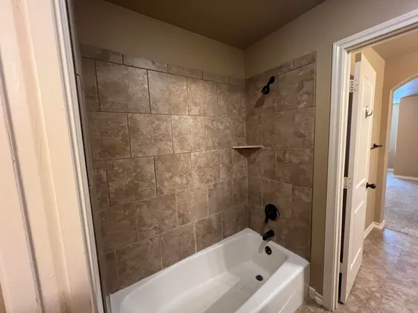 a bathroom with a bathtub