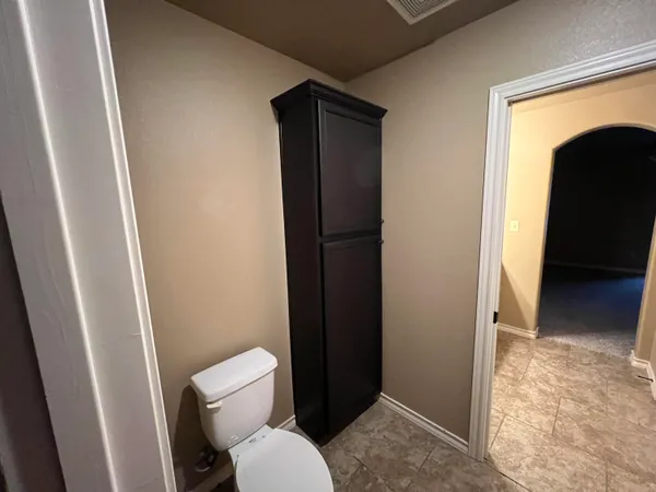 a bathroom with a toilet