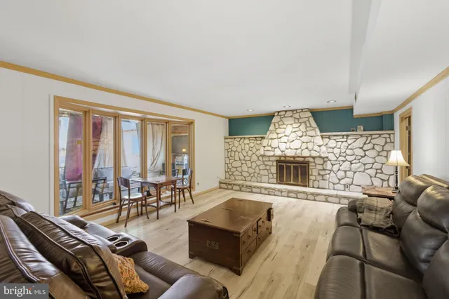 a front view of a building with swimming pool