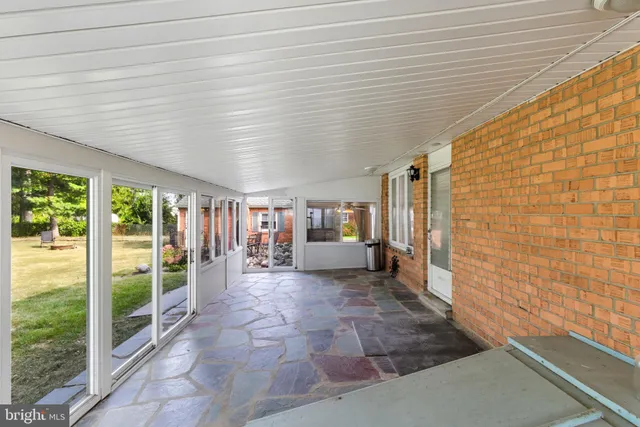 a view of outdoor space with playground and green space