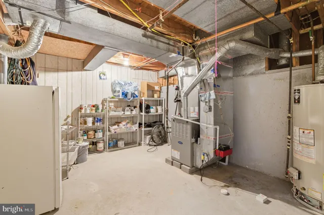 an aerial view of a house with yard swimming pool and outdoor seating