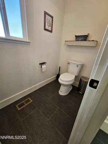 a storage room with washer and dryer