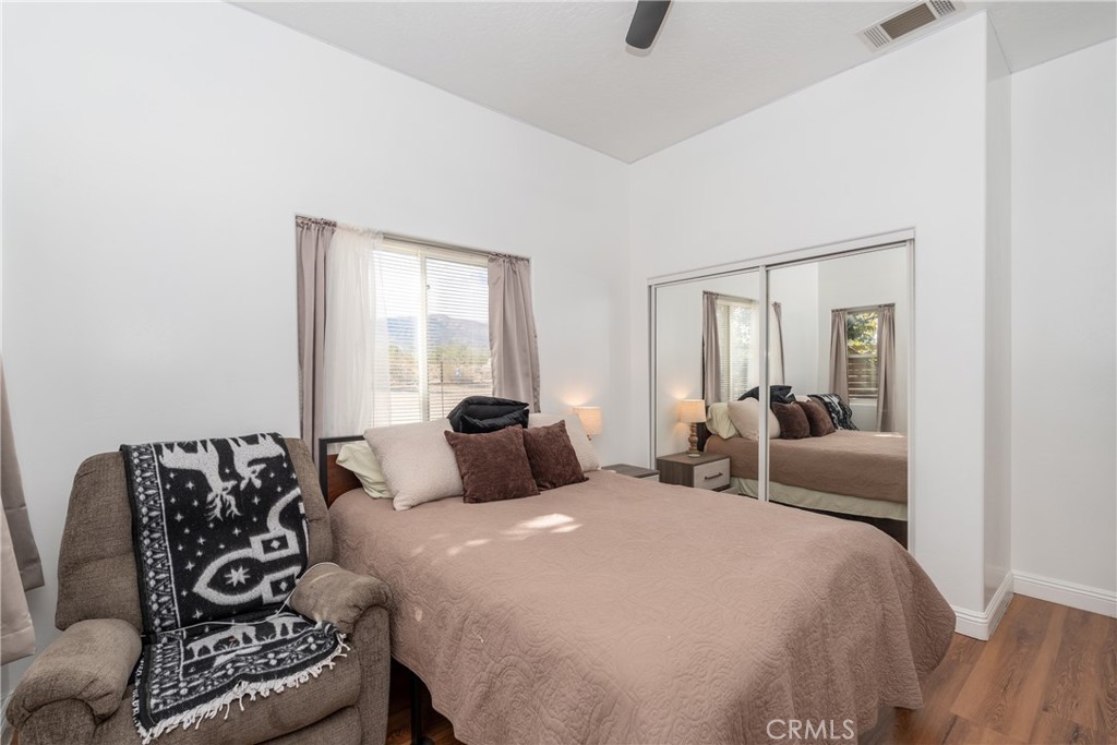 1830 Calaveras Road Pinon Hills, CA 92372 - Photo 18 of 38 a bedroom with a bed and a couch