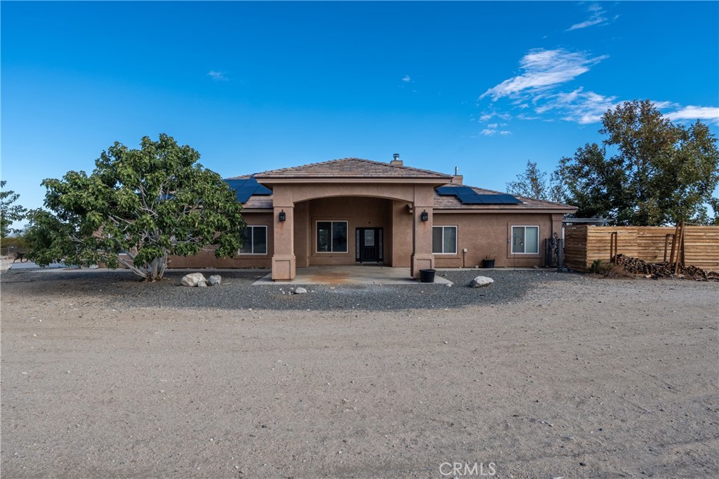 1830 Calaveras Road Pinon Hills, CA 92372 - Photo 2 of 38 a view of a house with a patio