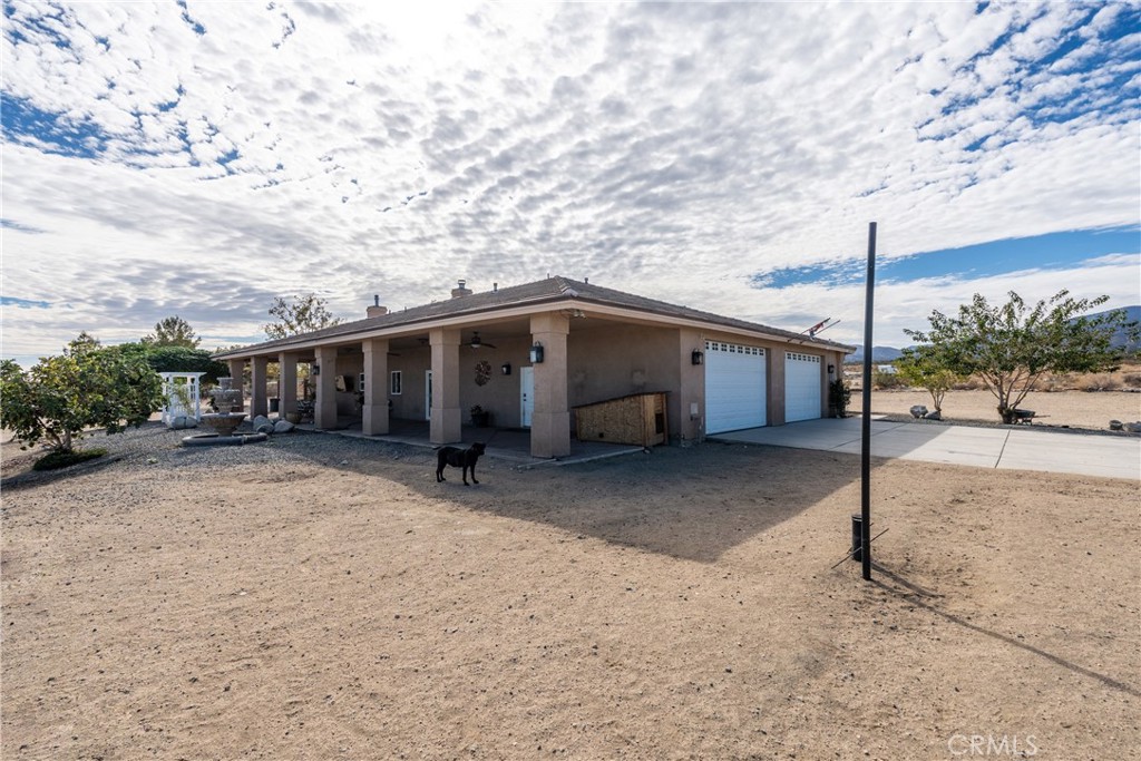 1830 Calaveras Road Pinon Hills, CA 92372 - Photo 27 of 38 a view of a house with a tree