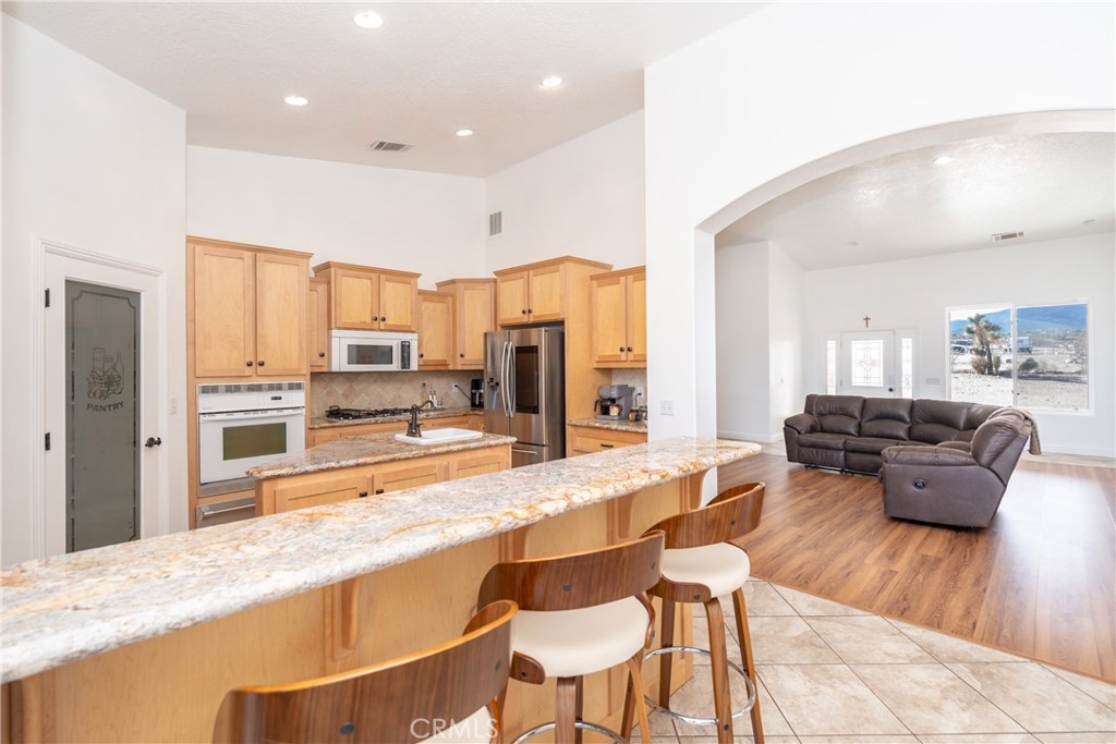 1830 Calaveras Road Pinon Hills, CA 92372 - Photo 10 of 38 a large kitchen with cabinets