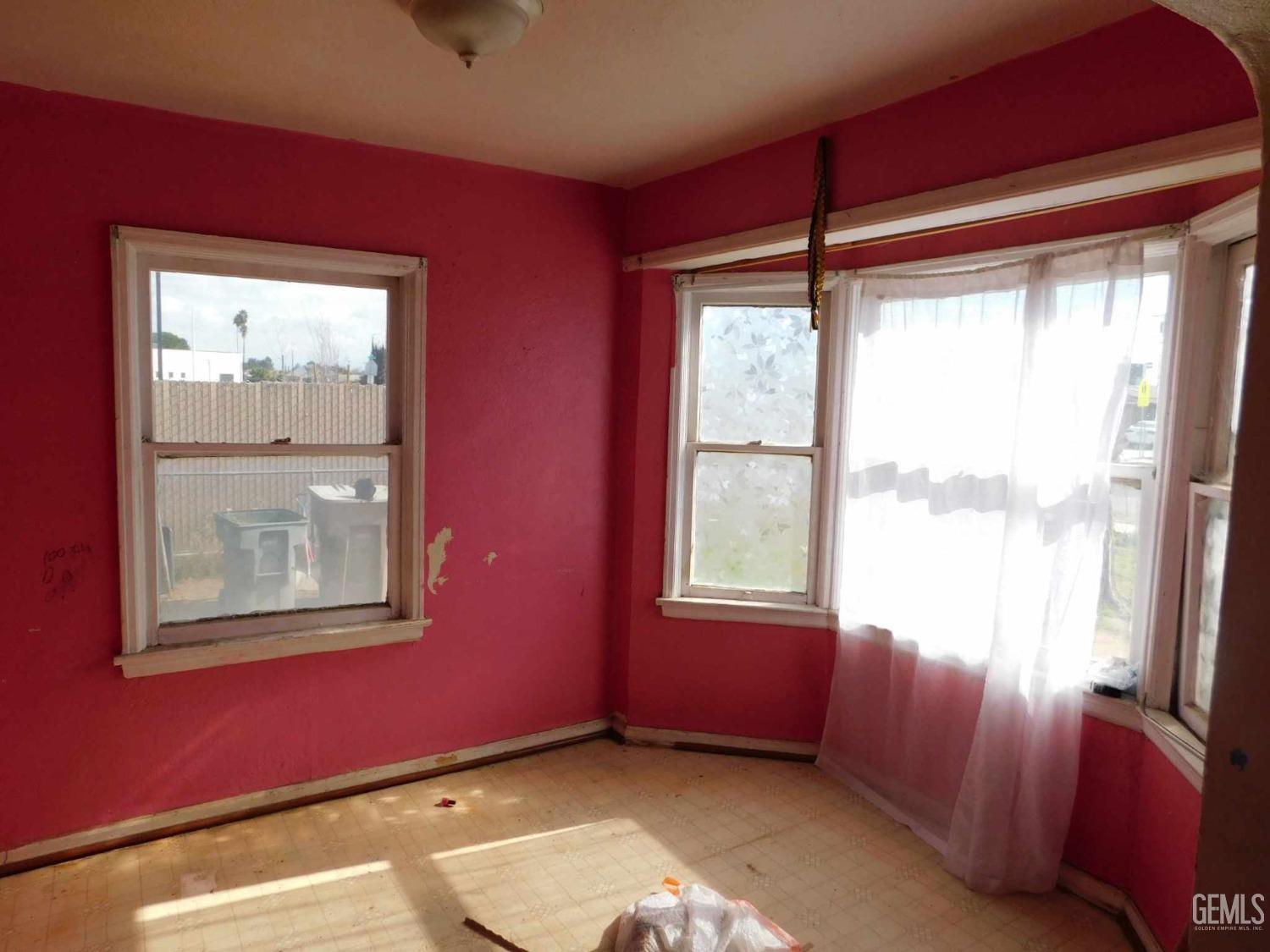 Undisclosed Address Bakersfield, CA 93305 - Photo 13 of 22 a view of an empty room with a window