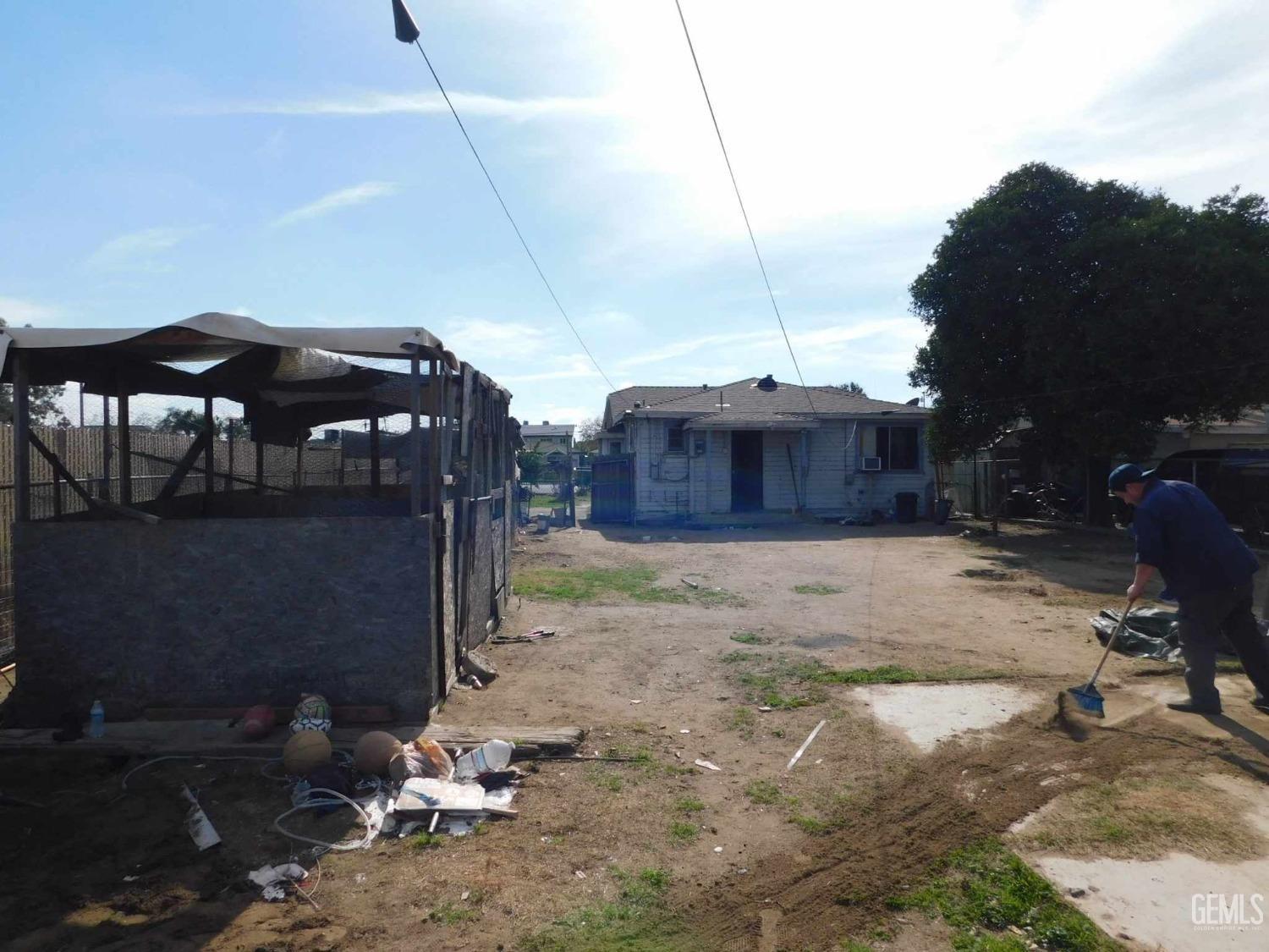 Undisclosed Address Bakersfield, CA 93305 - Photo 16 of 22 a view of a yard with an outdoor space