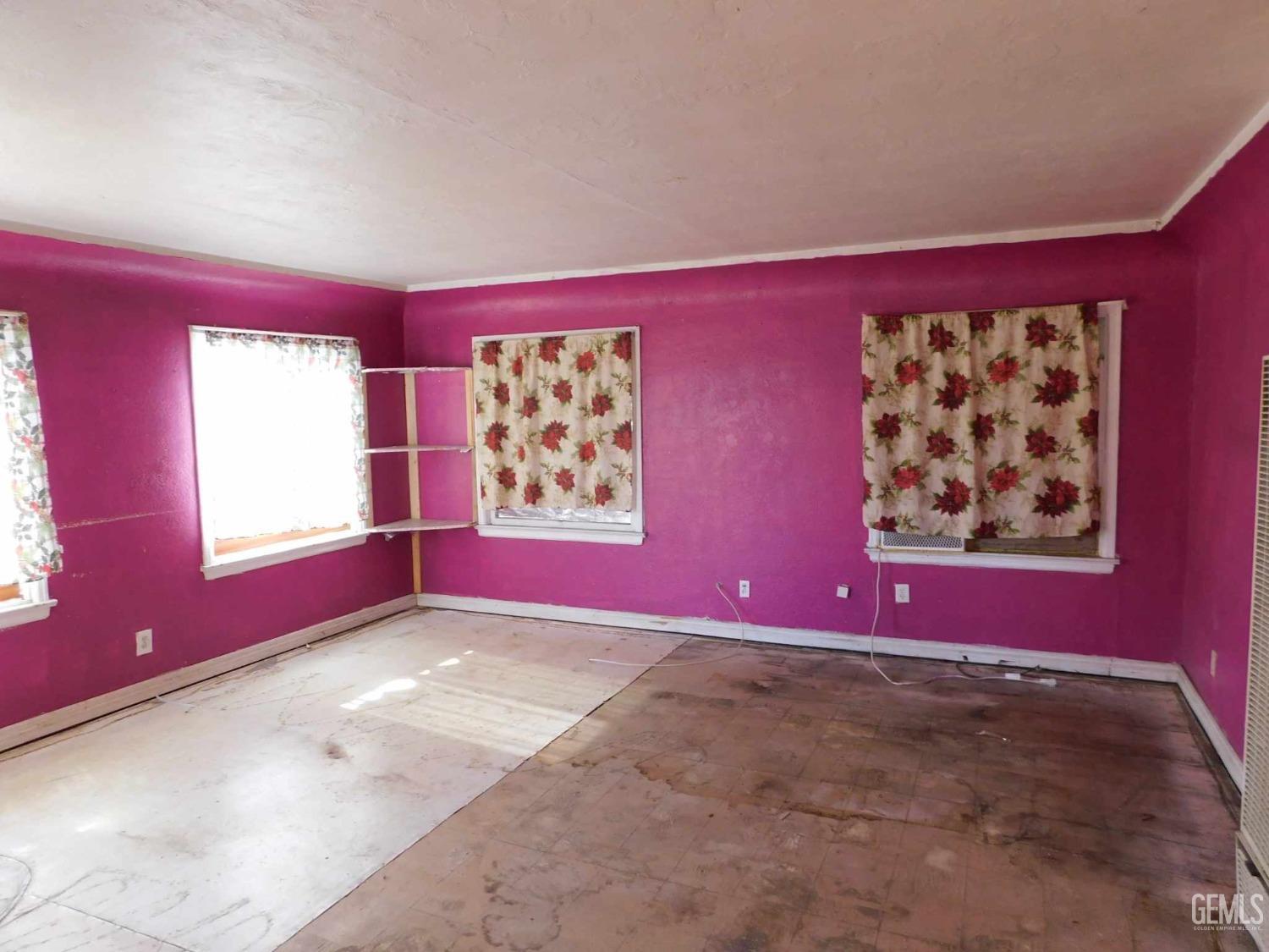 Undisclosed Address Bakersfield, CA 93305 - Photo 3 of 22 a view of empty room with window