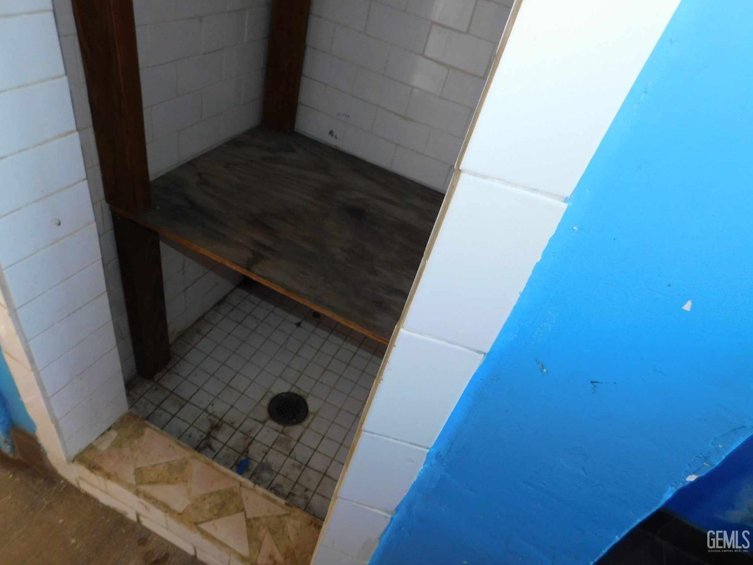 Undisclosed Address Bakersfield, CA 93305 - Photo 6 of 22 a bathroom with a shower