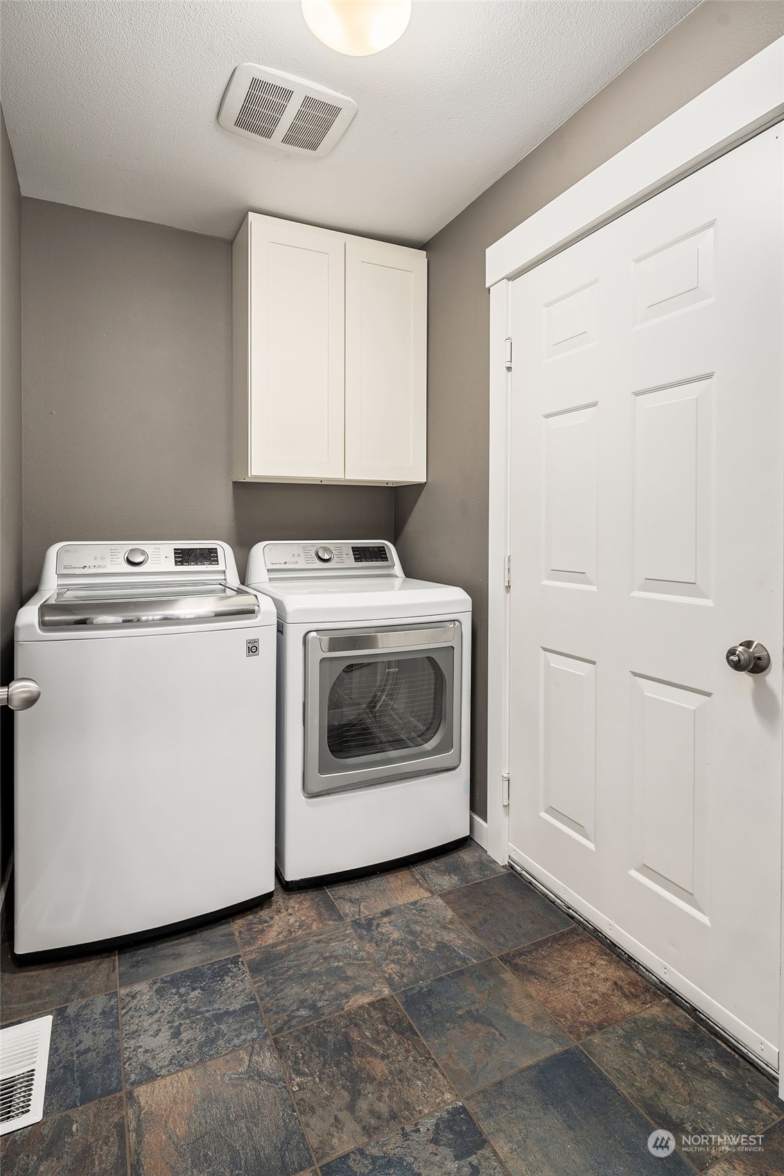 18651 Northeast 55th Way, Unit PP Redmond, WA 98052 - Photo 18 of 35 a utility room with dryer and washer