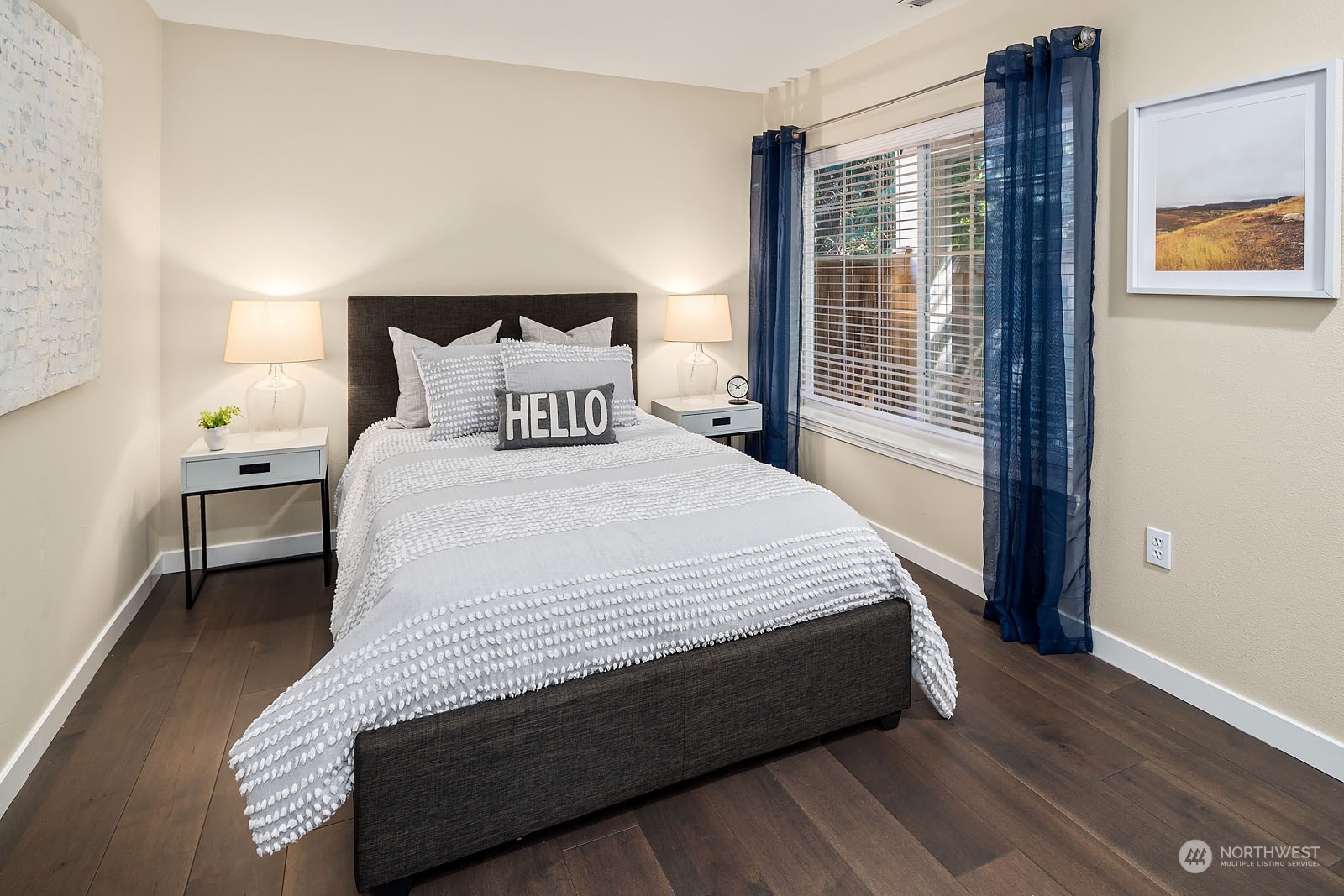 18651 Northeast 55th Way, Unit PP Redmond, WA 98052 - Photo 21 of 35 a large bed sitting in a bedroom next to a window