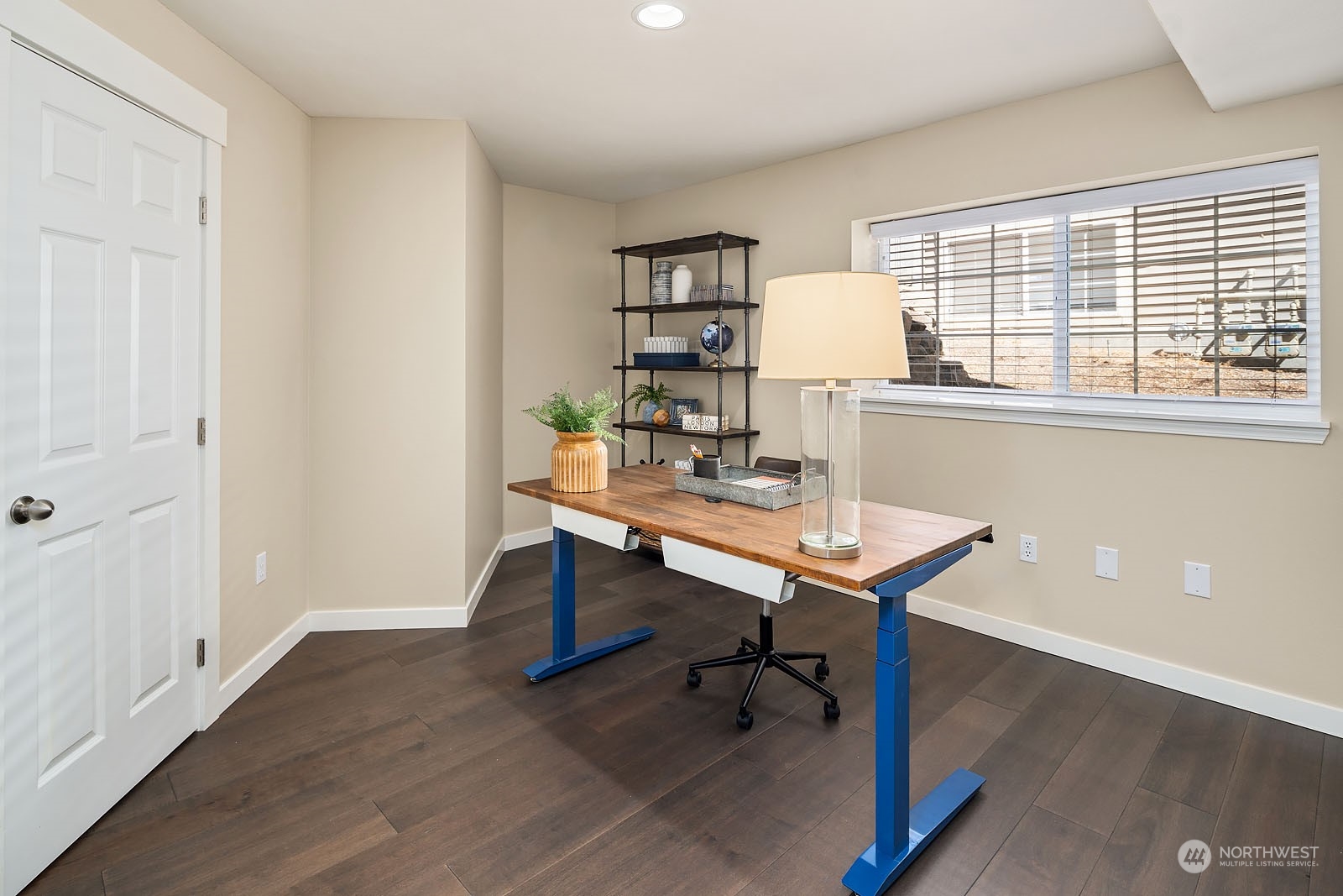 18651 Northeast 55th Way, Unit PP Redmond, WA 98052 - Photo 23 of 35 a view of a workspace with furniture and a window