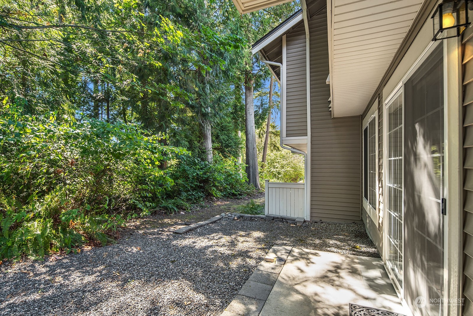 18651 Northeast 55th Way, Unit PP Redmond, WA 98052 - Photo 27 of 35 a view of a house with backyard