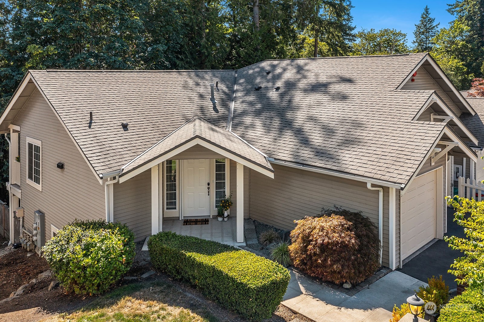 18651 Northeast 55th Way, Unit PP Redmond, WA 98052 - Photo 28 of 35 a aerial view of a house with a yard