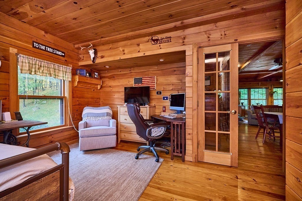 171 Tatro Road Ashfield, MA 01330 - Photo 26 of 42 a view of a room with wooden floor and furniture