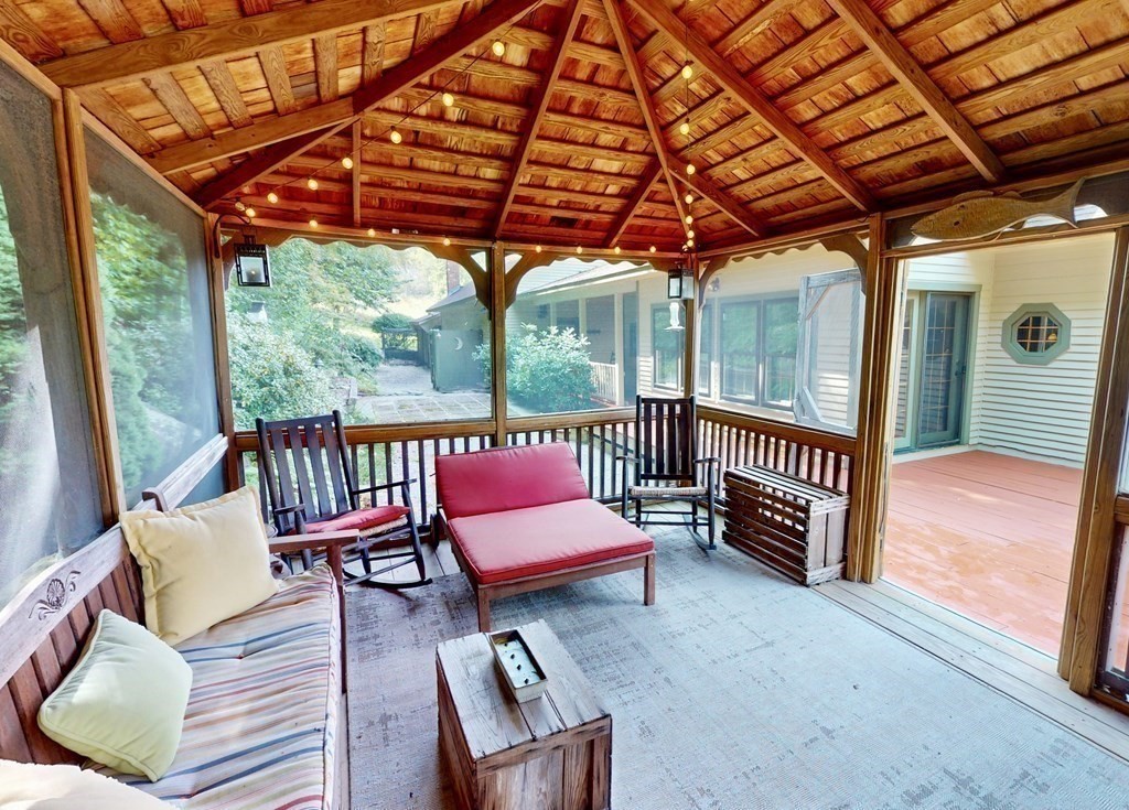 171 Tatro Road Ashfield, MA 01330 - Photo 31 of 42 a view of a patio with wooden floor and roof