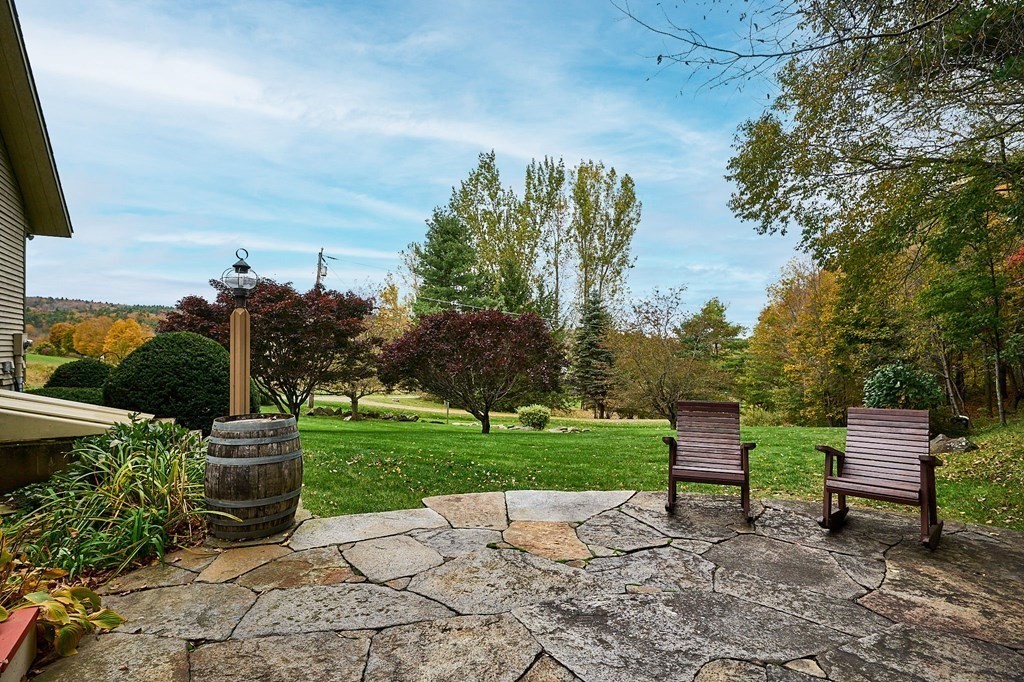 171 Tatro Road Ashfield, MA 01330 - Photo 33 of 42 a view of a garden with sitting area