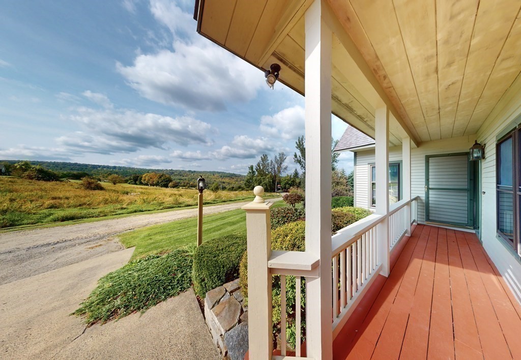171 Tatro Road Ashfield, MA 01330 - Photo 4 of 42 a view of a pathway with a balcony