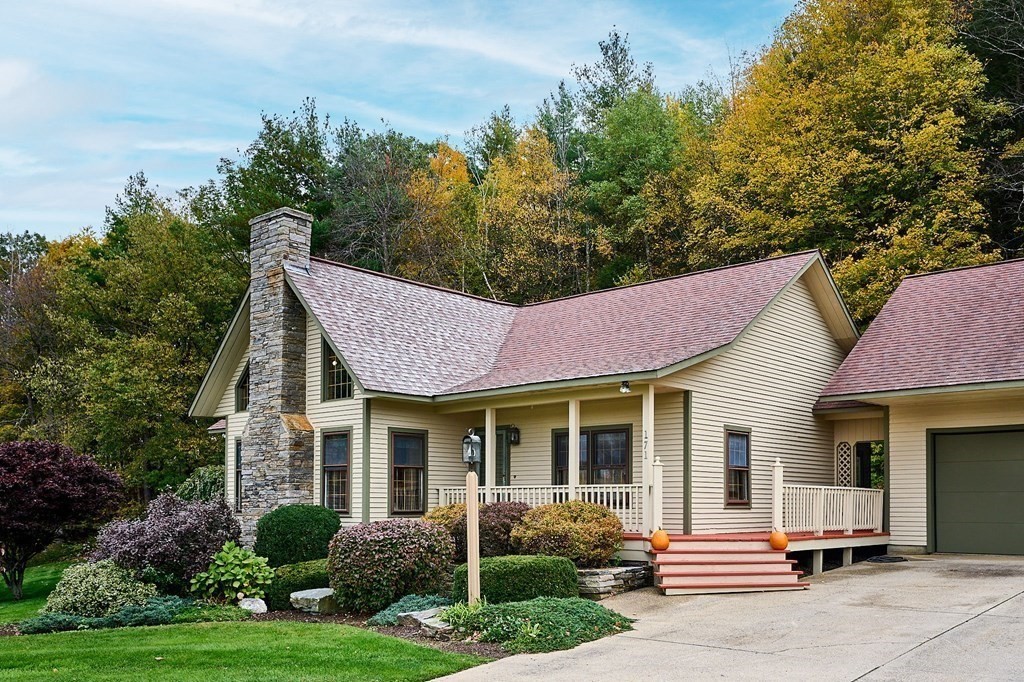 171 Tatro Road Ashfield, MA 01330 - Photo 42 of 42 a front view of a house with garden