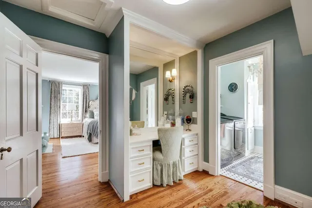 a bed room with furniture and a chandelier