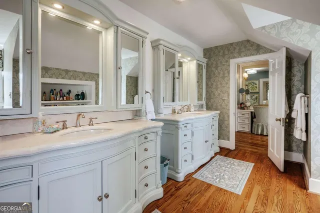 a room with furniture and pool table