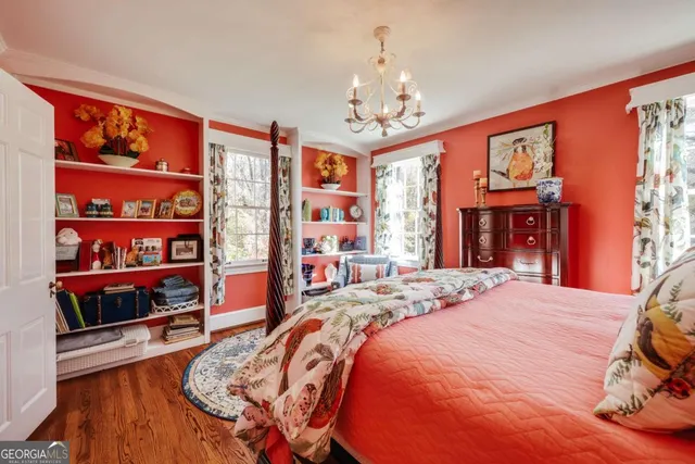 a view of a backyard with swimming pool