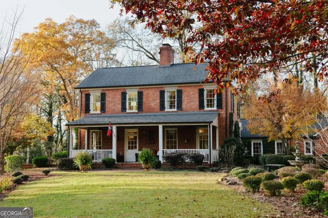 an aerial view of residential house with outdoor space