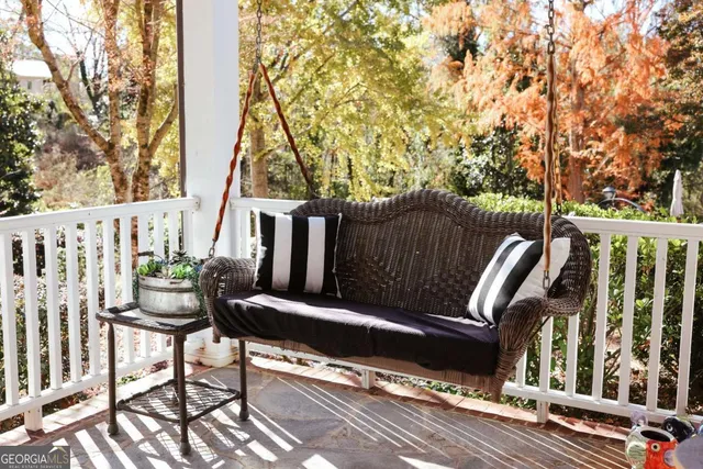 a view of a park with large trees