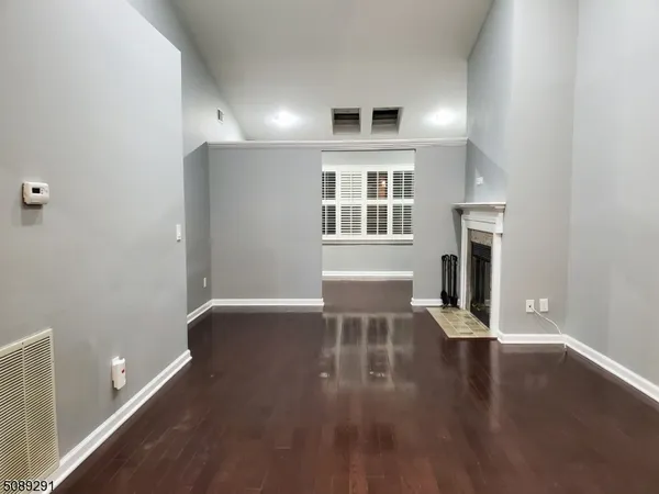 a view of livingroom with furniture and wooden floor