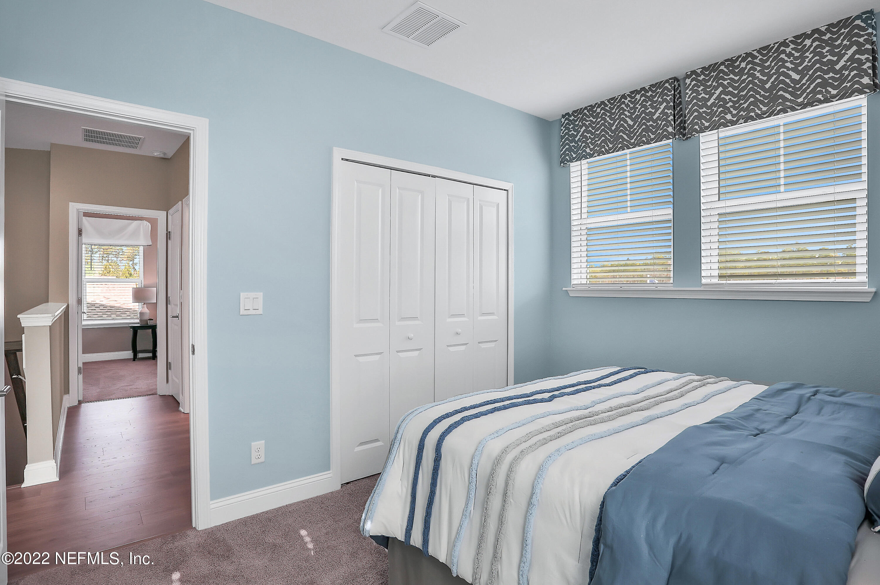117 Crew Court St. Augustine, FL 32092 - Photo 34 of 64 a bedroom with a balcony and a bed