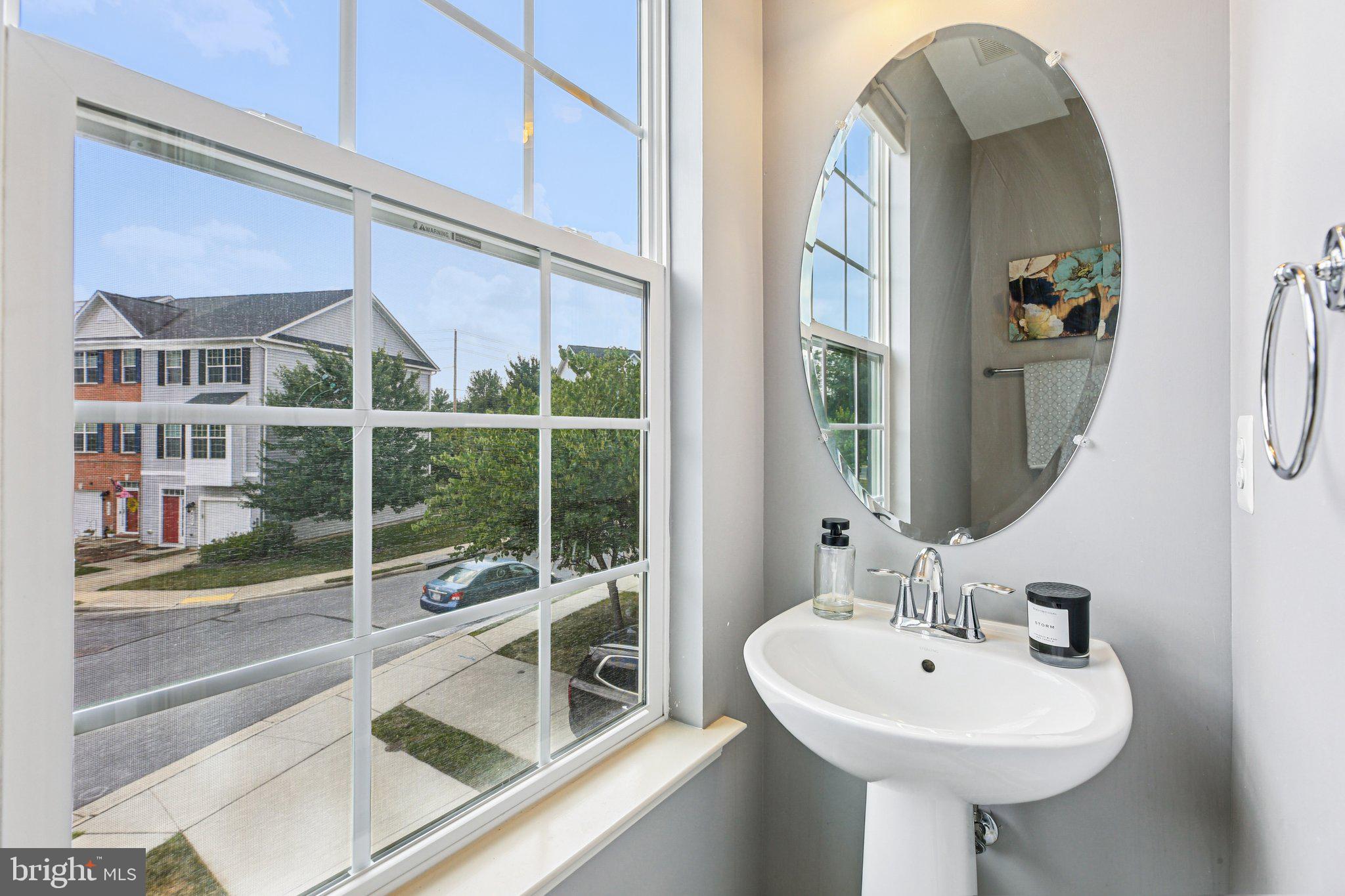 690 Tivoli Road Frederick, MD 21703 - Photo 18 of 43 a bathroom with a sink and a mirror