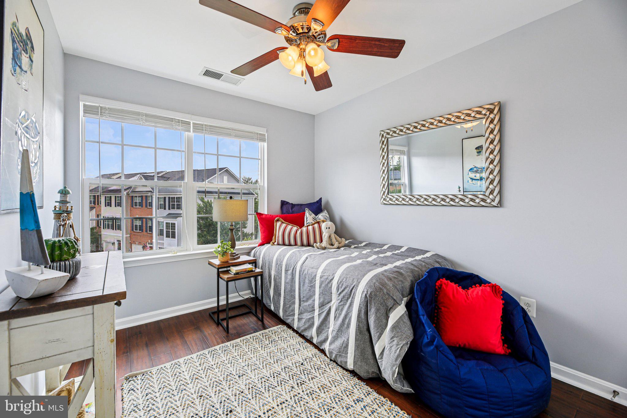 690 Tivoli Road Frederick, MD 21703 - Photo 29 of 43 a bedroom with a bed and a window