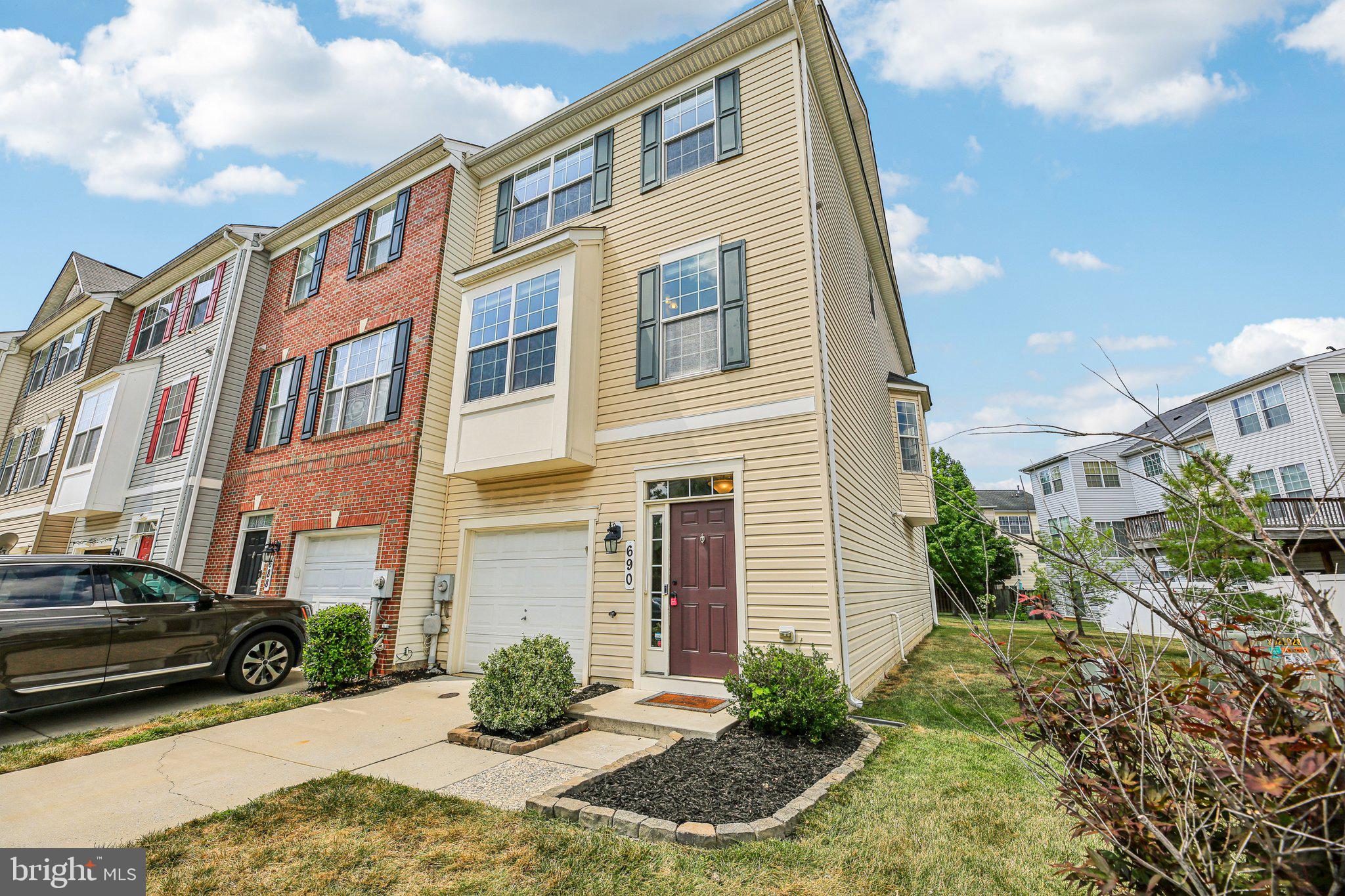 690 Tivoli Road Frederick, MD 21703 - Photo 3 of 43 a view of a buildings with many windows