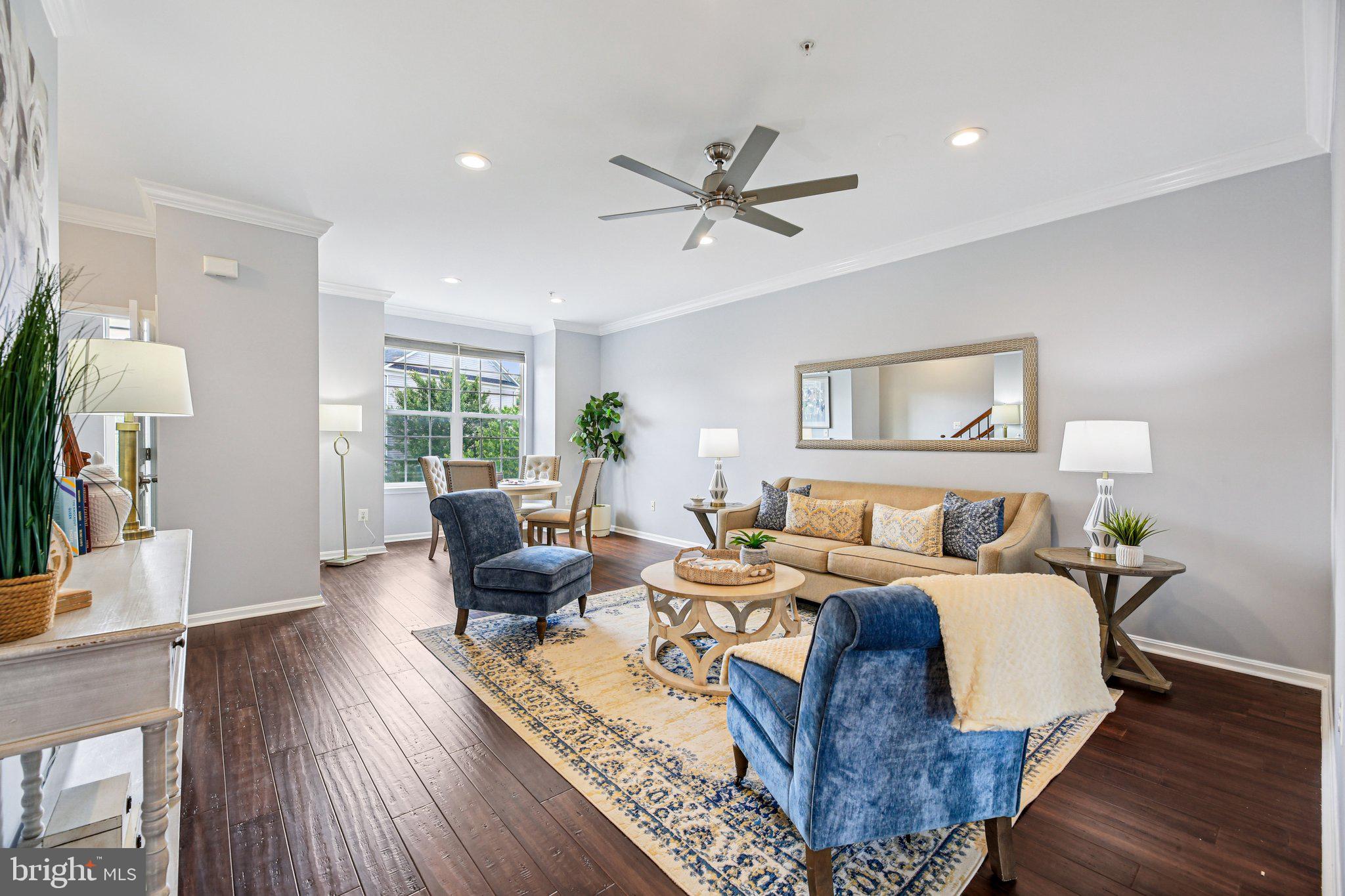 690 Tivoli Road Frederick, MD 21703 - Photo 5 of 43 a bed room with couch and wooden floor